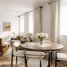 living area that includes ample seating spaces and bright lighting
