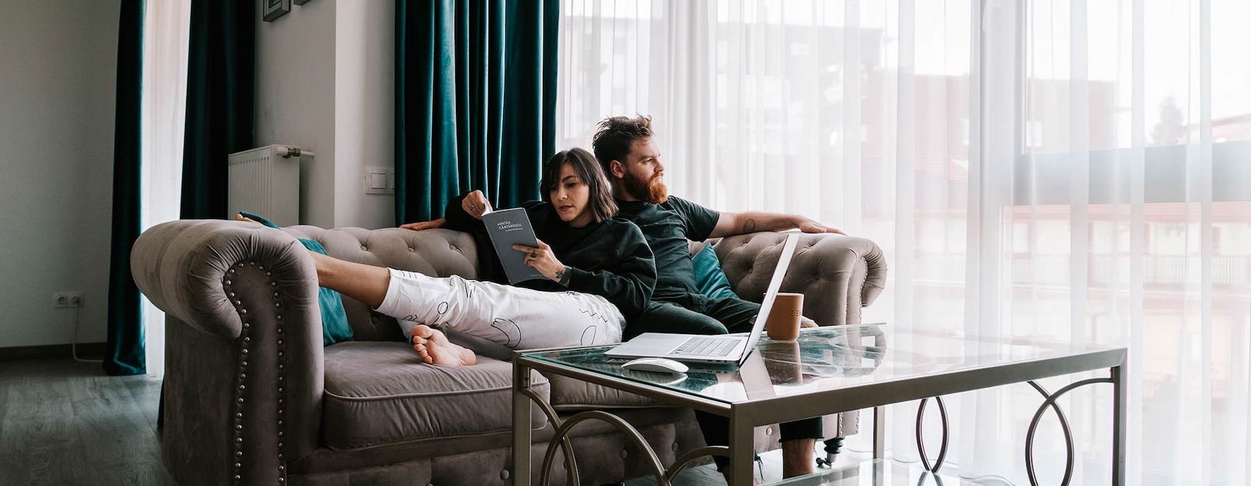 a man and a woman sitting on a couch